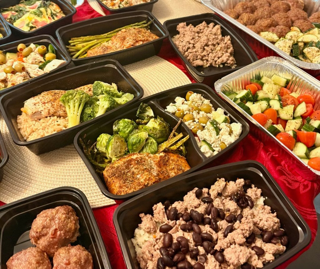 A full table of Hope & Harvest prepared meals