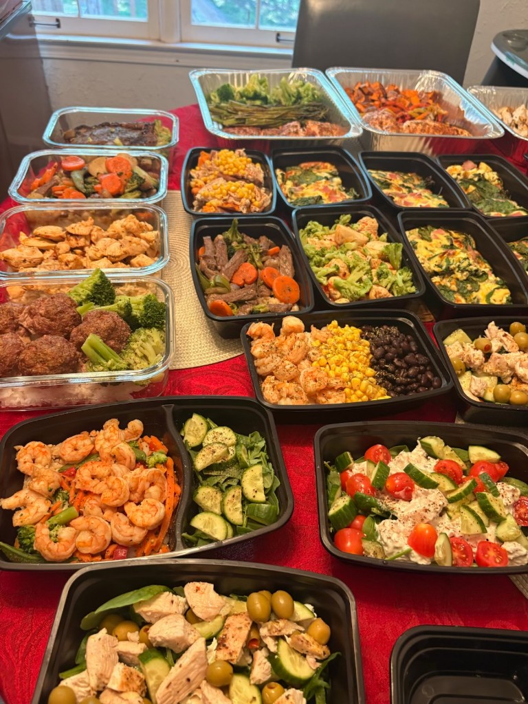 Assorted meal prep dishes and catering trays
